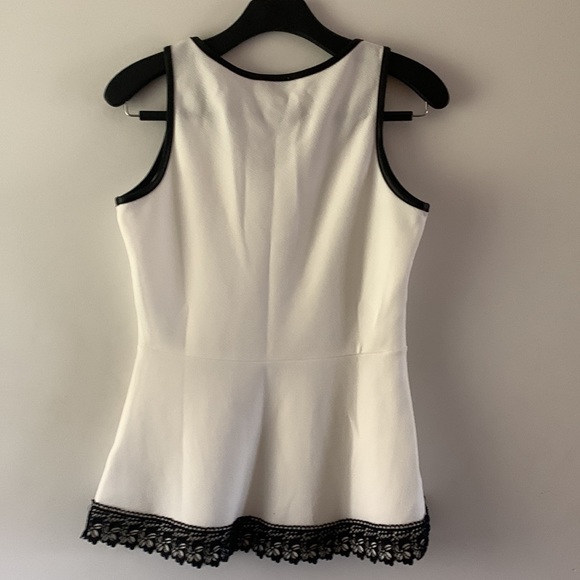 Ricki’s Size S white with black accent’s sleeveless top. - Picture 2 of 7